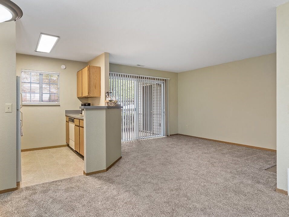 apartment living room with a sliding glass door