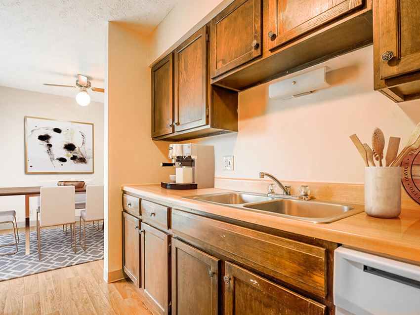 apartment kitchen with wooden cabinets - Photo Gallery