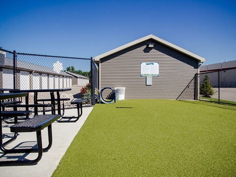 our apartments showcase a dog park with a playground