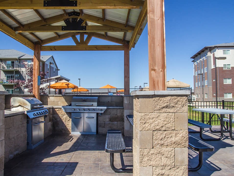 our apartments showcase a beautiful covered outdoor kitchen