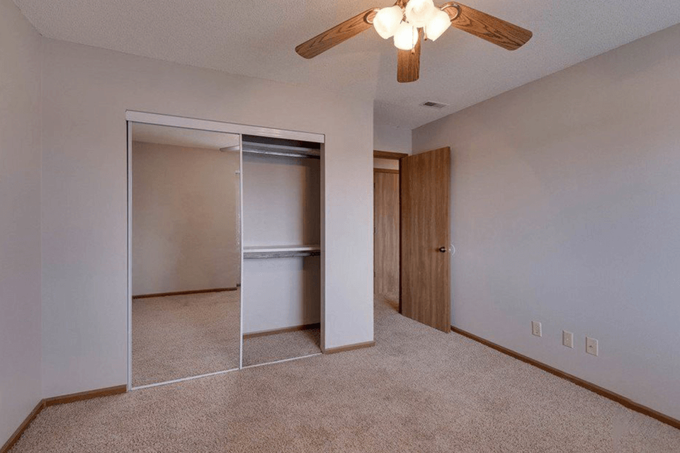apartment bedroom with closet