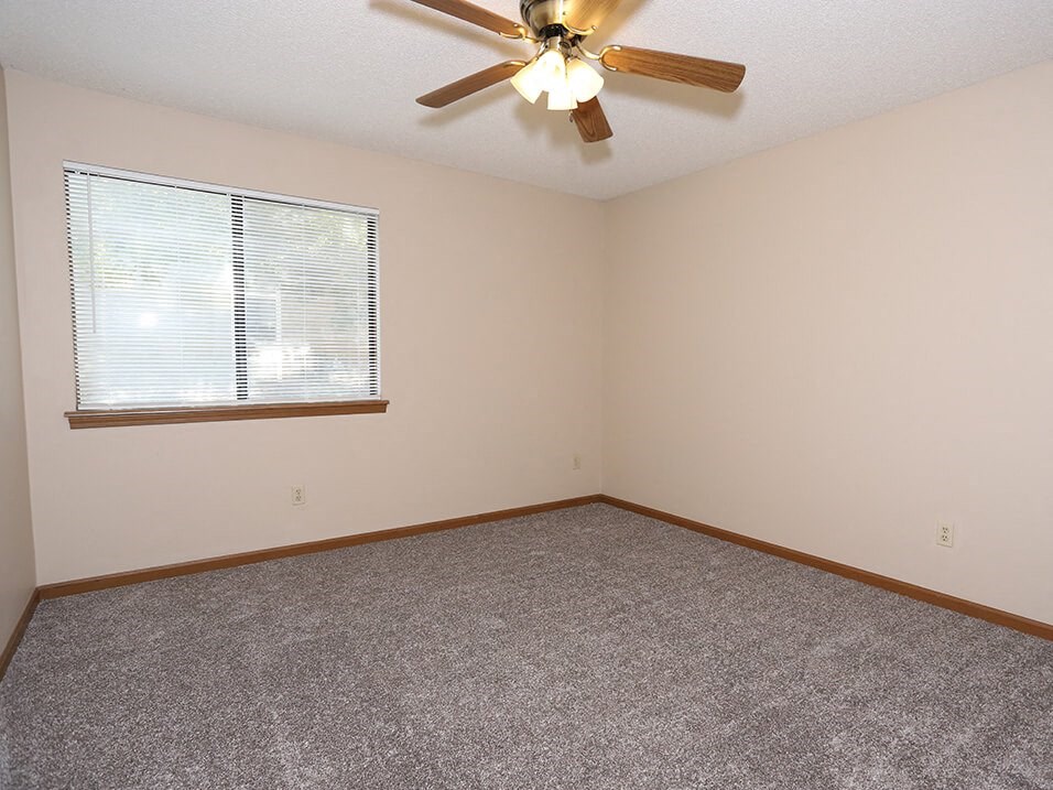 Carpeted Badrooms with Overhead Fans