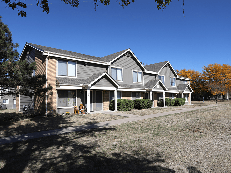 Exterior of building at cross creek apartments and townhomes