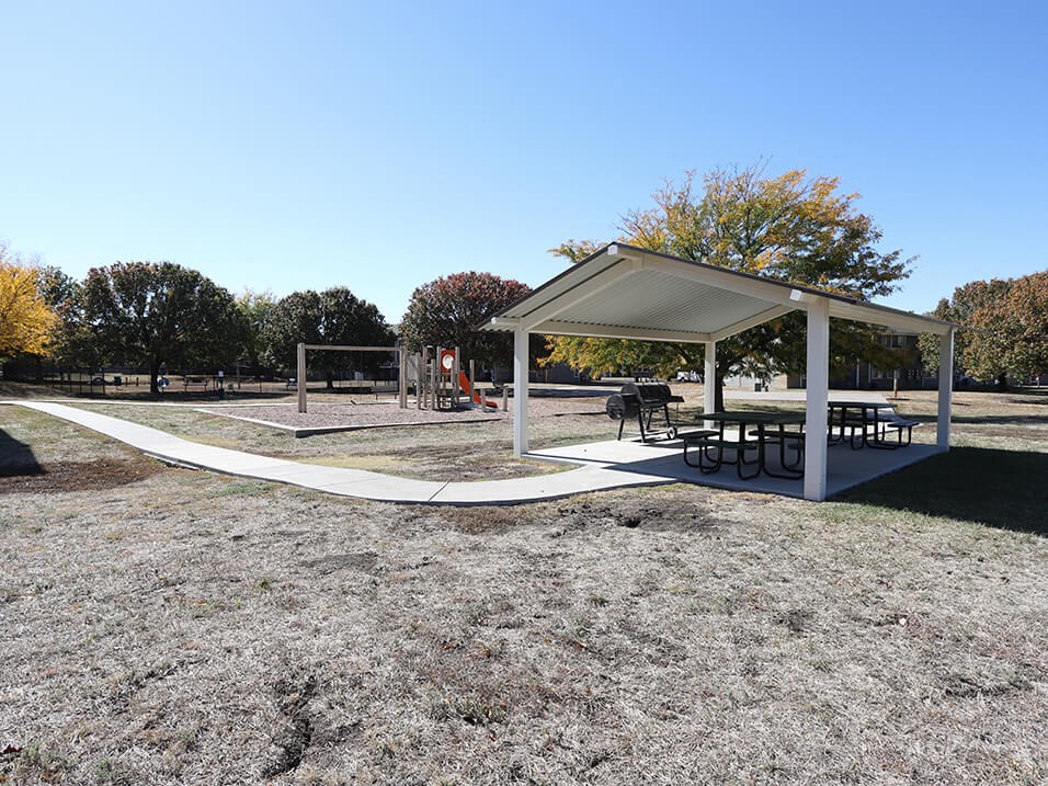 playground and covered picnic area at cross creek apartments and townhomes