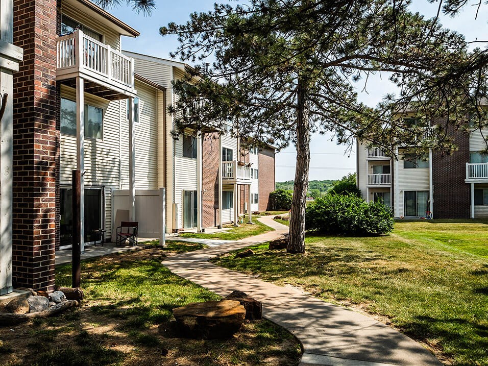 our apartments offer a tree shaded walkway