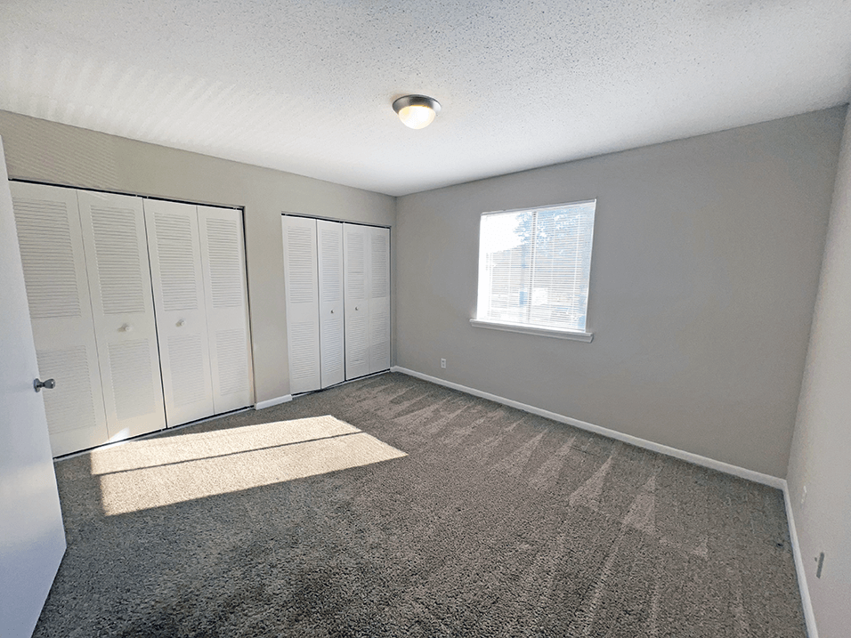 Dual closets in bedroom