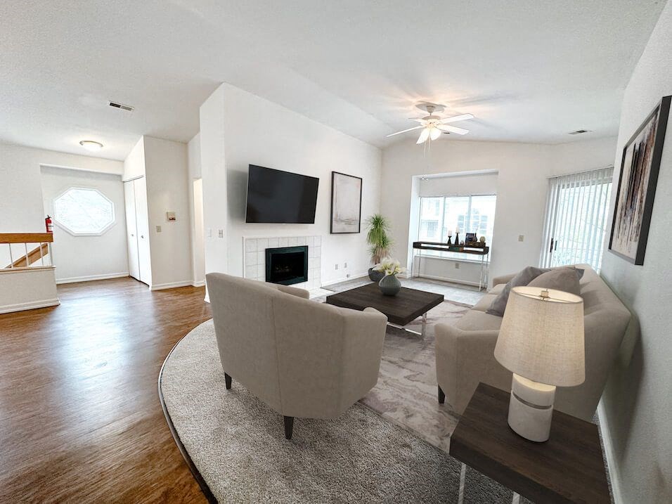 a living room with a couch and a table