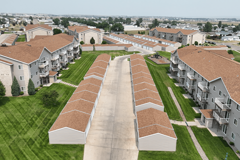 A large housing complex with a long road running through it.