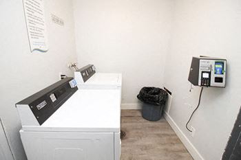 a laundry room with a washer and dryer