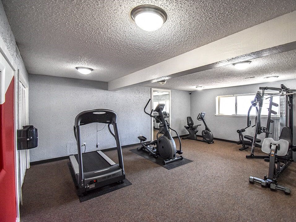 the gym in our apartments is equipped with cardio machines and weights