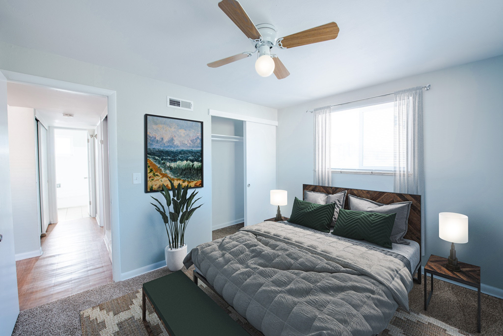 bedroom with natural light and closet space