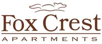 The image is a logo for "Fox Crest Apartments".