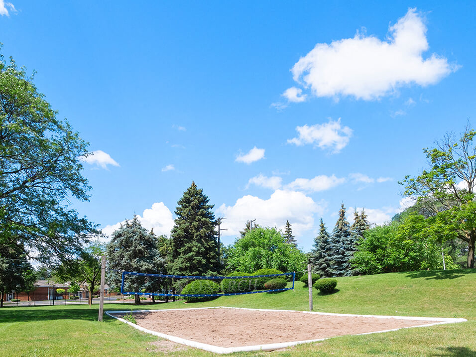sand volleyball court at apartment complex