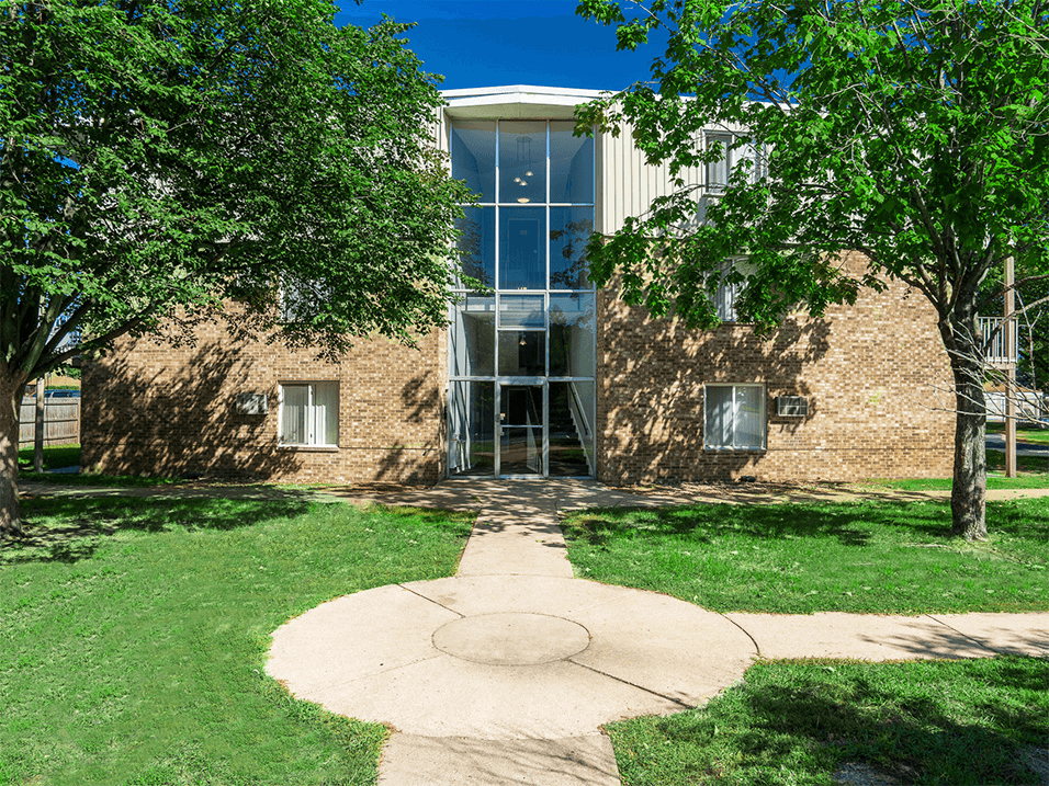 exterior of apartment building at fountains in the park