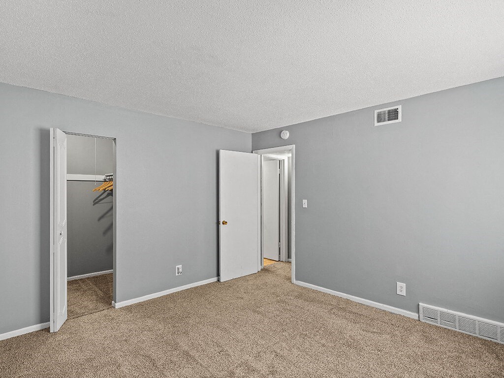 bedroom with walk in closet