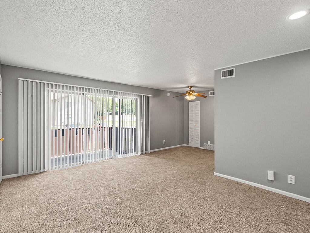 living room with sliding glass door to patio