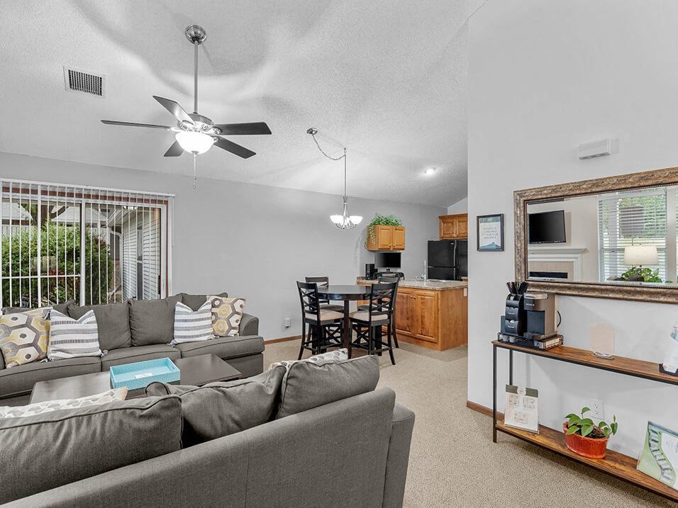 a living room with a couch and a table