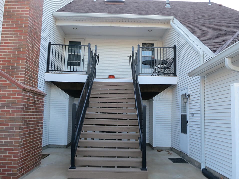 the stairs to the balcony of a house