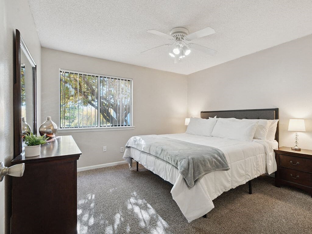 bedroom with a bed and a ceiling fan