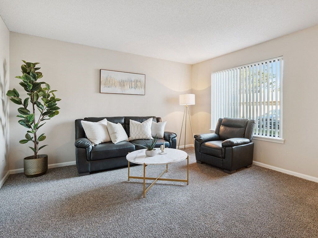 apartment living with furniture and a table