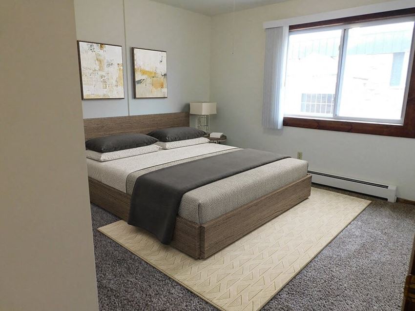bedroom with natural light in heritage manor apartments