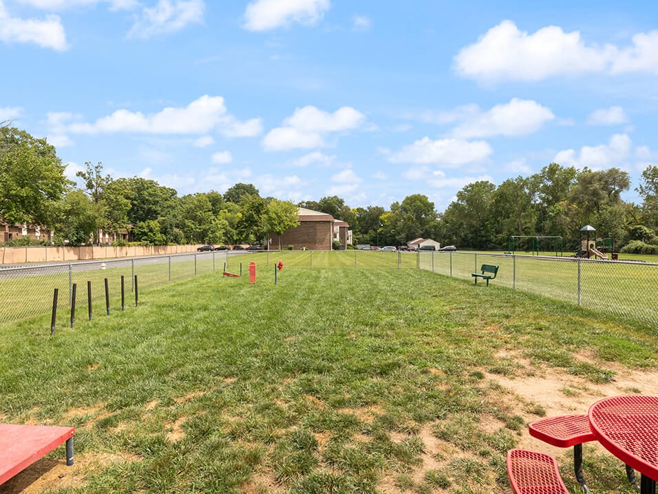 dog park with a fence at apartment complex