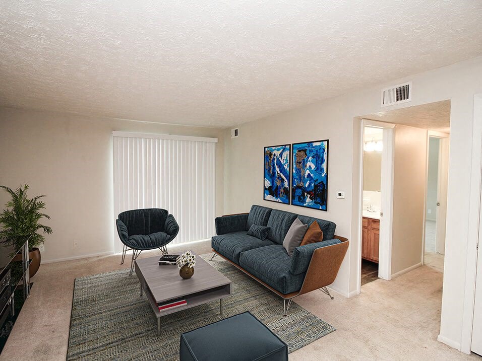 a living room with a couch and a coffee table