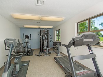 on-site fitness center at indian woods apartments - Photo Gallery 6