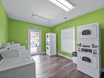 Laundry Facility at Addison Par Apartments - Photo Gallery 12