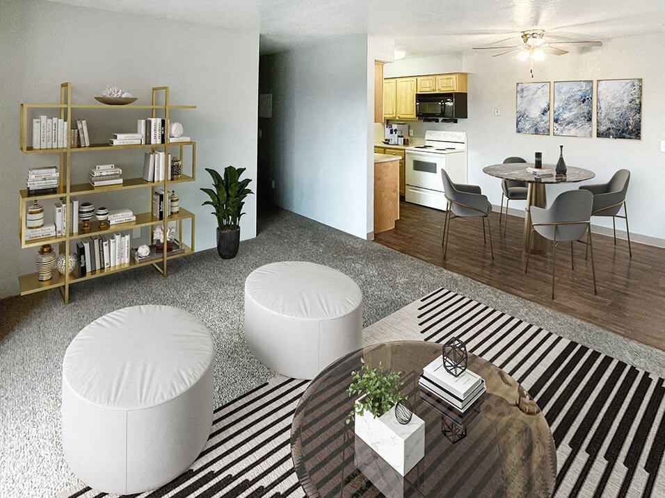 a living room and kitchen with a table and chairs