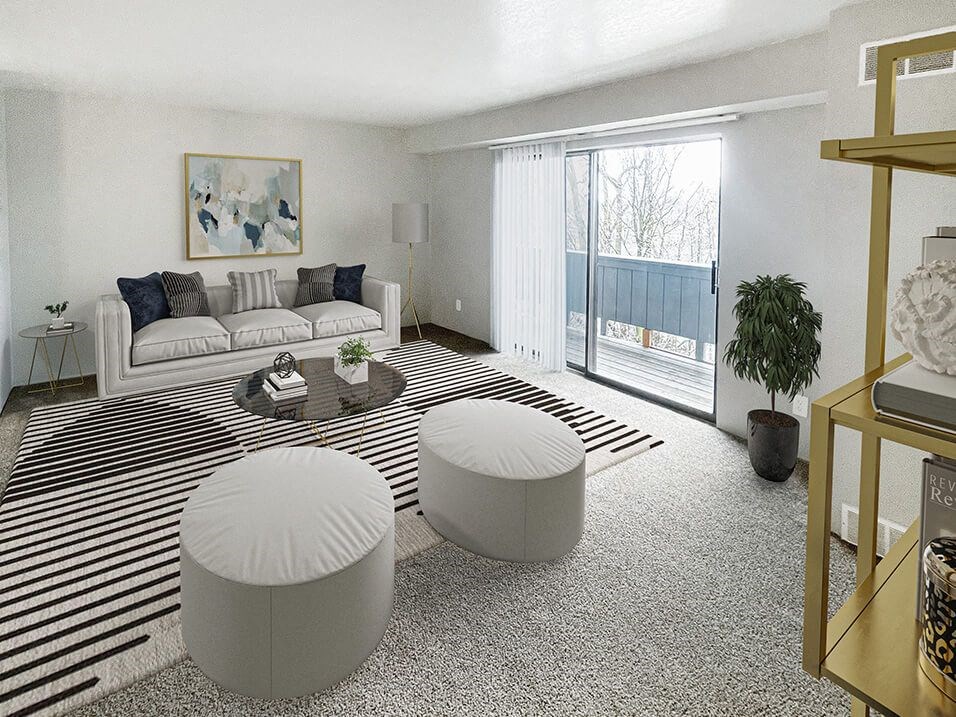 a living room with white furniture and a striped rug