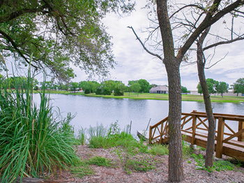 lake at MacArthur's Lake Apartments - Photo Gallery 2