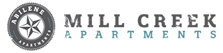 The image is a logo for Mill Creek Apartments.