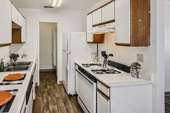 Apartment with refrigerator at Mesa Gardens