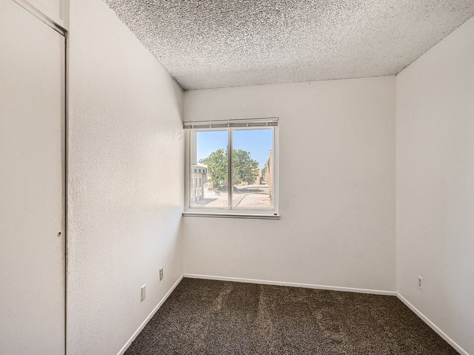 bedroom with window at mesa gardens
