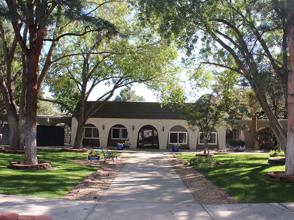 a building with trees in front of it