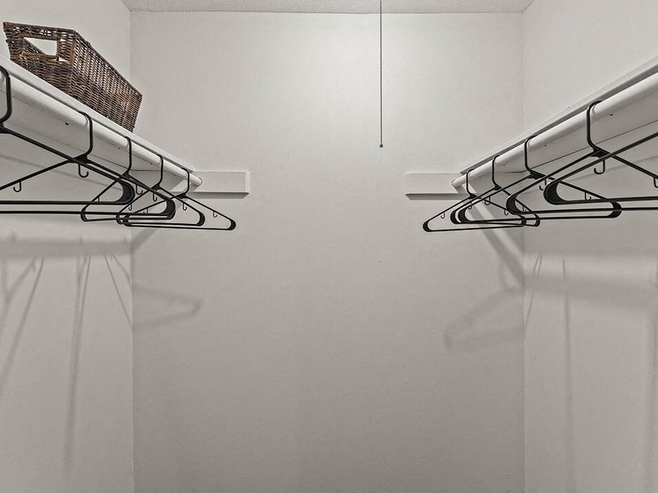 a walk-in closet at apartment at the retreat at mill creek