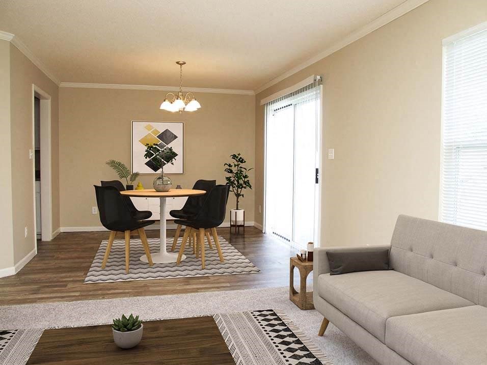 a living room with a table and a couch