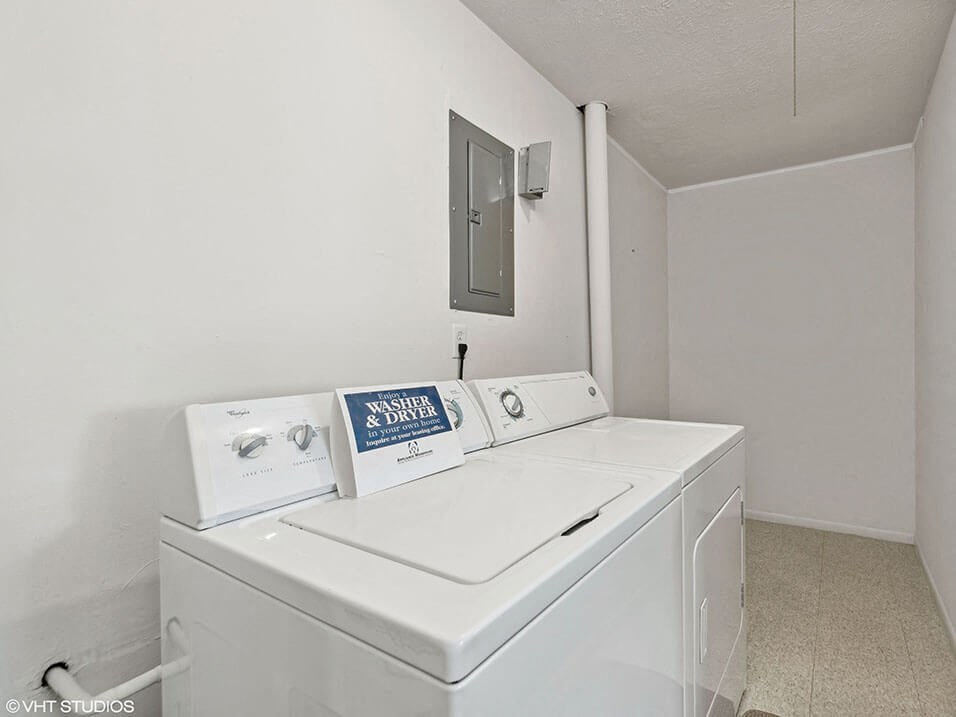 resident laundry room with washer/dryer at apartment complex
