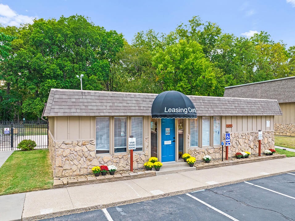 the leasing office is located in the parking lot of the leasing bay building