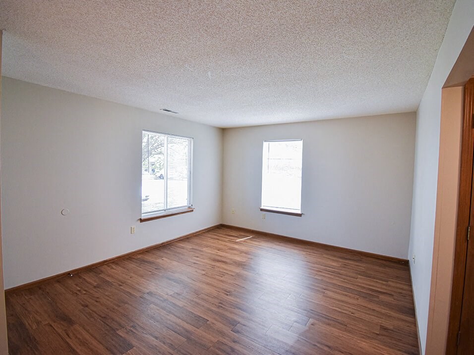 bedroom with 2 windows