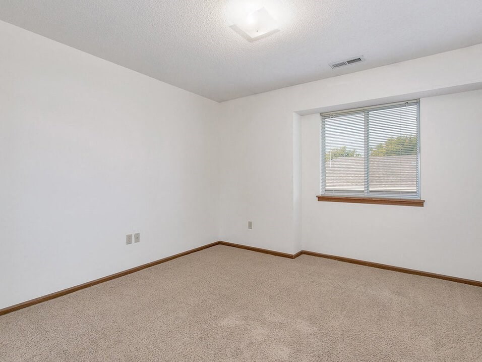 bedroom with white walls