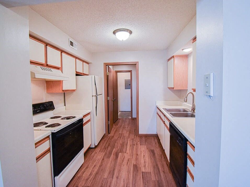 Kitchen with dishwasher and double sink