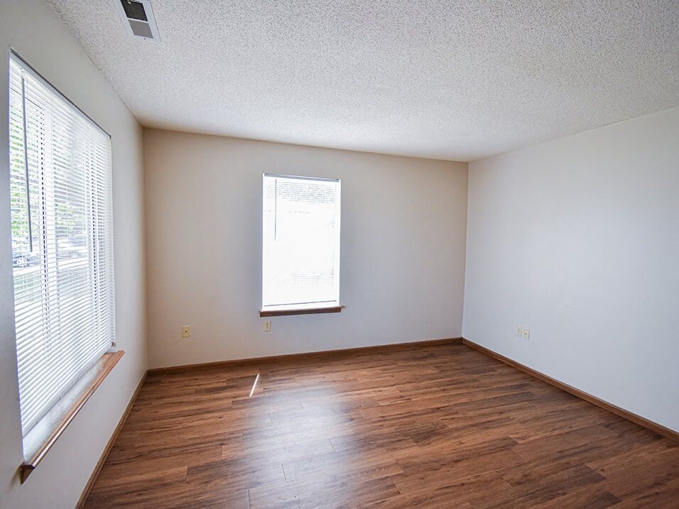 Living Room with window and hardwood style flooring