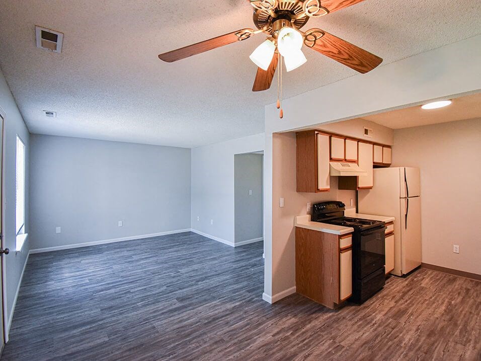 kitchen and dining area with hardwood style flooring