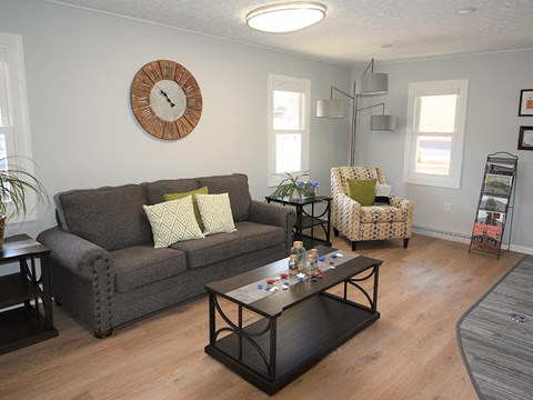 a living room with a couch and a coffee table