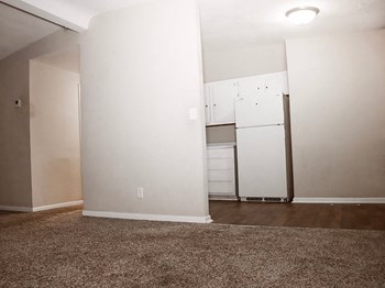 connected living and kitchen area at northwind apartments - Photo Gallery 4