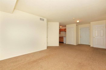 Emerald Creek Living Room northern Michigan apartments - Photo Gallery 4
