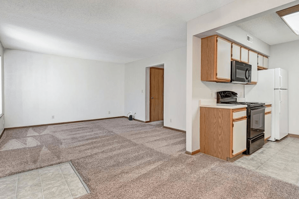 living room and kitchen at apartment complex