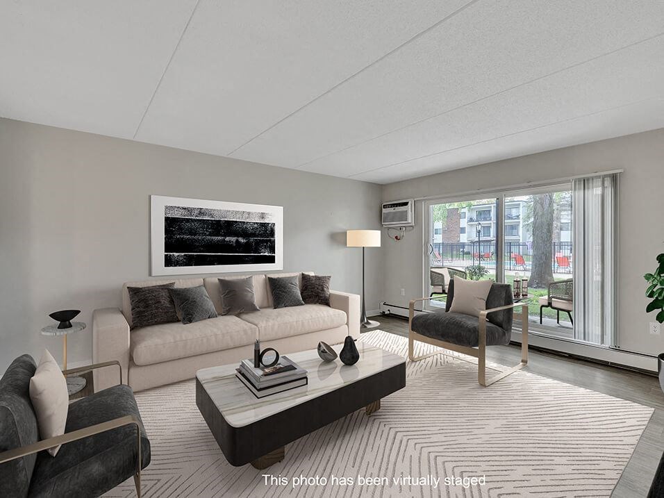 a living room with a couch and a table